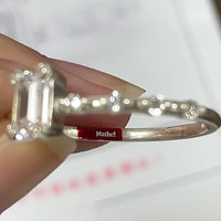 Two custom engagement rings